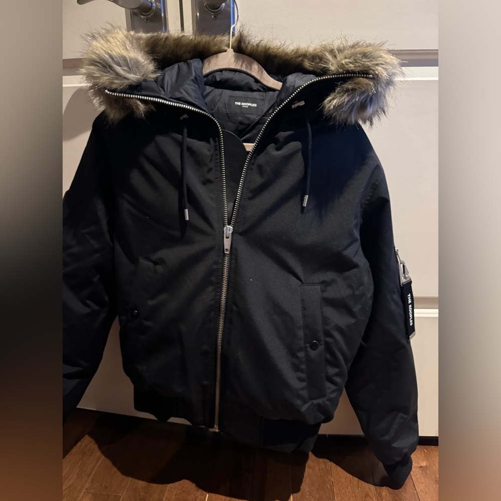 THE KOOPLES men’s puffer coat with faux fur hood and leather detailing